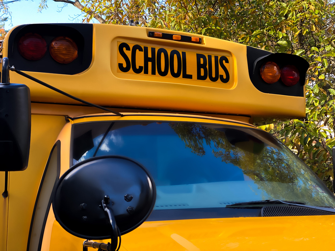 front view of traditional yellow school bus