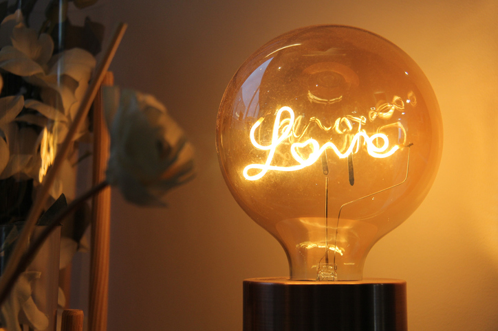 Light bulb decoration with the word love written inside