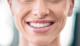 Woman, teeth and smile for dental care, surgery or healthcare hygiene and healthy wellness. Closeup of happy female face and mouth smiling for tooth whitening, oral or dentist treatment and grooming